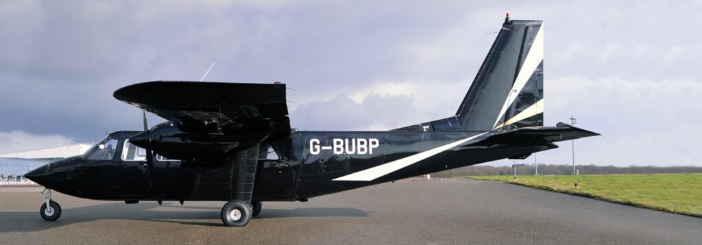 Islander aircraft G-BUBP in black livery was used in a James Bond movie - Spectre.