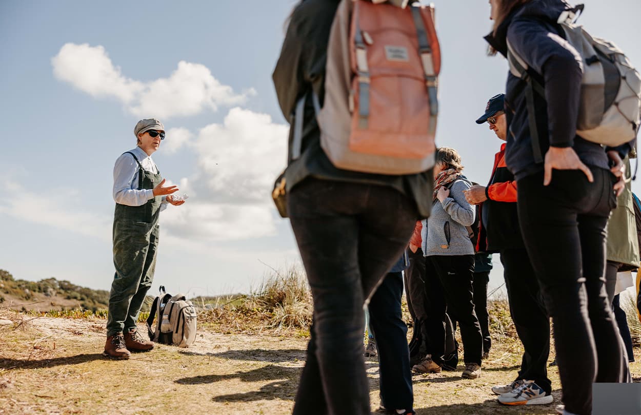 group on a walking tour around Bryher - group travel