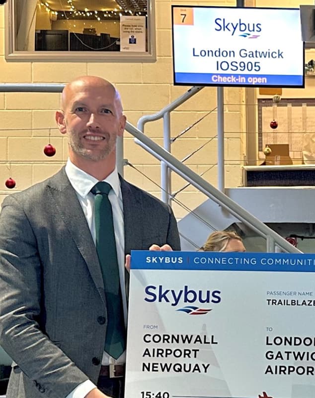 Stuart Reid celebraring first flight between Newquay and london gatwick with SKybus