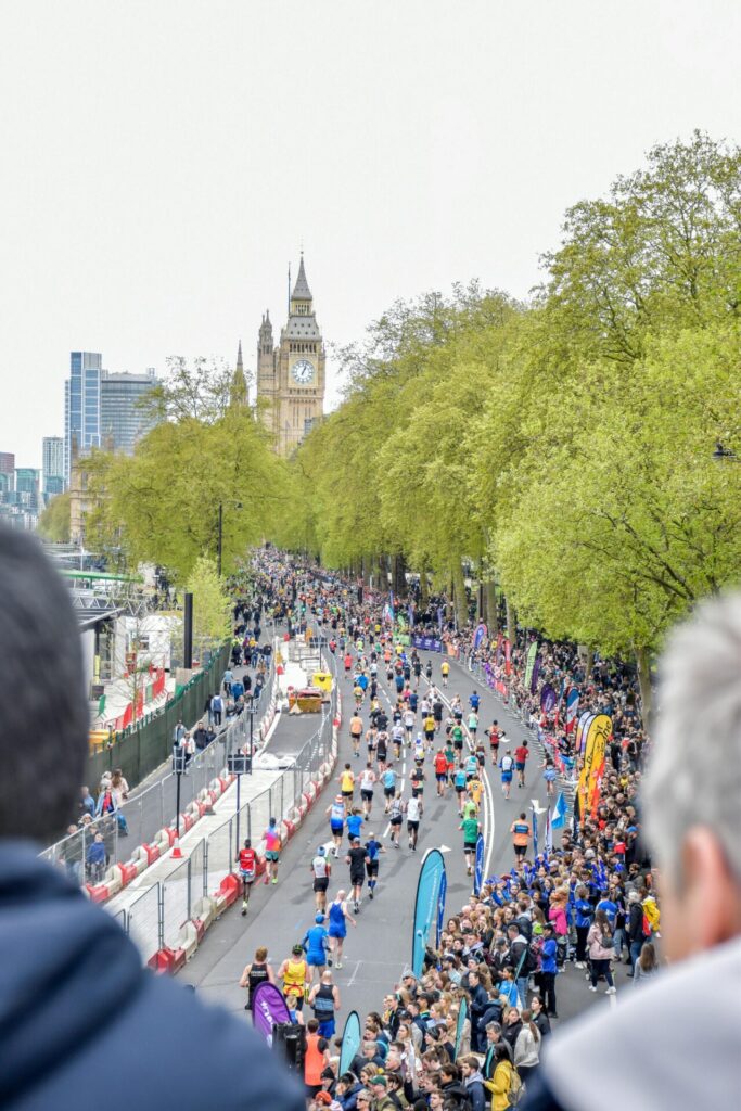 London marathon runners running towards Big Ben.